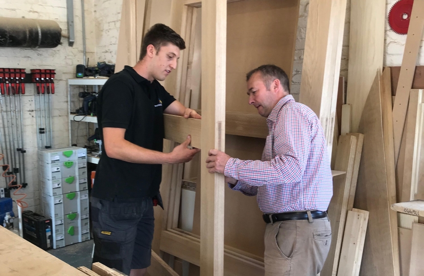 Simon Hart MP with leading apprentice Chris Caine from Kilgetty at DH Carpentry in Pembroke Dock.