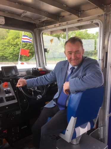 Simon Hart MP is pictured on board the new Glansteffan ferry which is linking Llansteffan and Ferryside for the first time in 60 years.